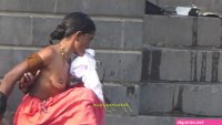 indian woman bathing naked near river
