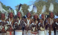 fulani teen swimming with man in naked