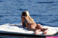 anna louise shows off her sexy body in a green bikini on the beach in miami