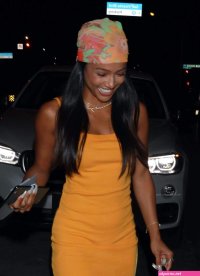 karrueche tran stuns in an orange sherbet dress while out in hollywood
