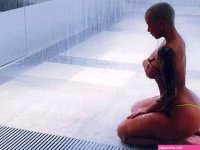 Amber Rose poses in nothing but a tiny thong for Instagram shower snap