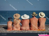 Naked Family Hats Sitting On Beach Stock Photo 461237521