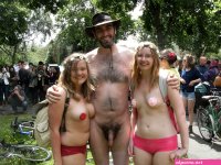File:Naked man and two topless women at World Naked Bike Ride Cardiff 2013.jpg