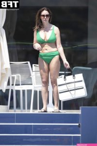 Chanelle Hayes Cools Off in a Shower Before Reading a Book by the Pool on Holiday