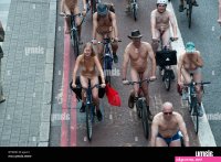 World Naked Bike RIde London June 2009. Group of naked men and women on bikes viewed from above Stock Photo