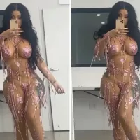 Cardi B goes nearly nude dances in JUST pink stickers beads as she promotes new single UP