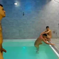 Naked boys in the pool