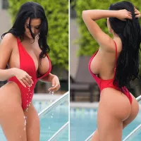 Playboy Model Becky Hudson Shows Off Curves in Tiny Red Swimsuit