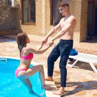 Lad fishes the cutie out of the pool