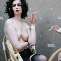 Young sexy nude women smoking Stock Photo