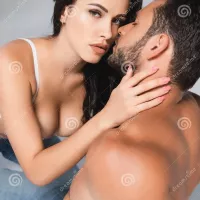 Woman with Big Breast Touching Bearded Stock Image