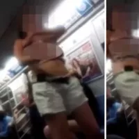 WATCH: Outrage as singing woman gets her boobs out on underground train
