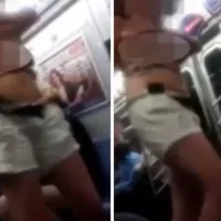 WATCH: Outrage as singing woman gets her boobs out on underground train