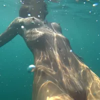 Nude Model Swims on a Public Beach in Russia: Russian Porn
