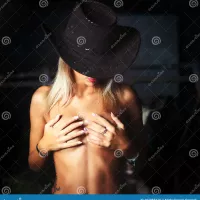 Naked Country Girl Wearing Cowboy Hat and Covering Her Brea Stock Image