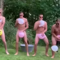 Four Swedish guys dancing naked with balloons