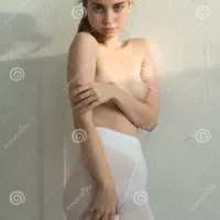 Young Beautiful Girl Posing Nude in Studio Stock Photo