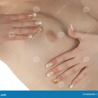 Woman Hand Holding Her Breast Stock Image