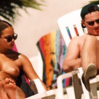 Angela Griffin photographed topless with her boyfriend on the beach in Spain