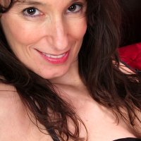 Brunette MILF with tiny tits Shelly spreading her ass and undressing