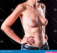 Breast Self Exam. Naked Female Topless Breast on Black Background. Stock Image