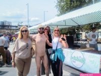 File:Nude in public with women.jpg
