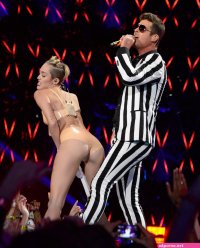Inside iconic VMA moments including Lady Gagas meat dress Kanye Wests dig at Taylor Swift and Rose McGowan naked