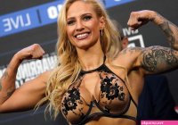 Watch Ebanie Bridges leave presenter stunned as boxer flashes boobs mid-intervie