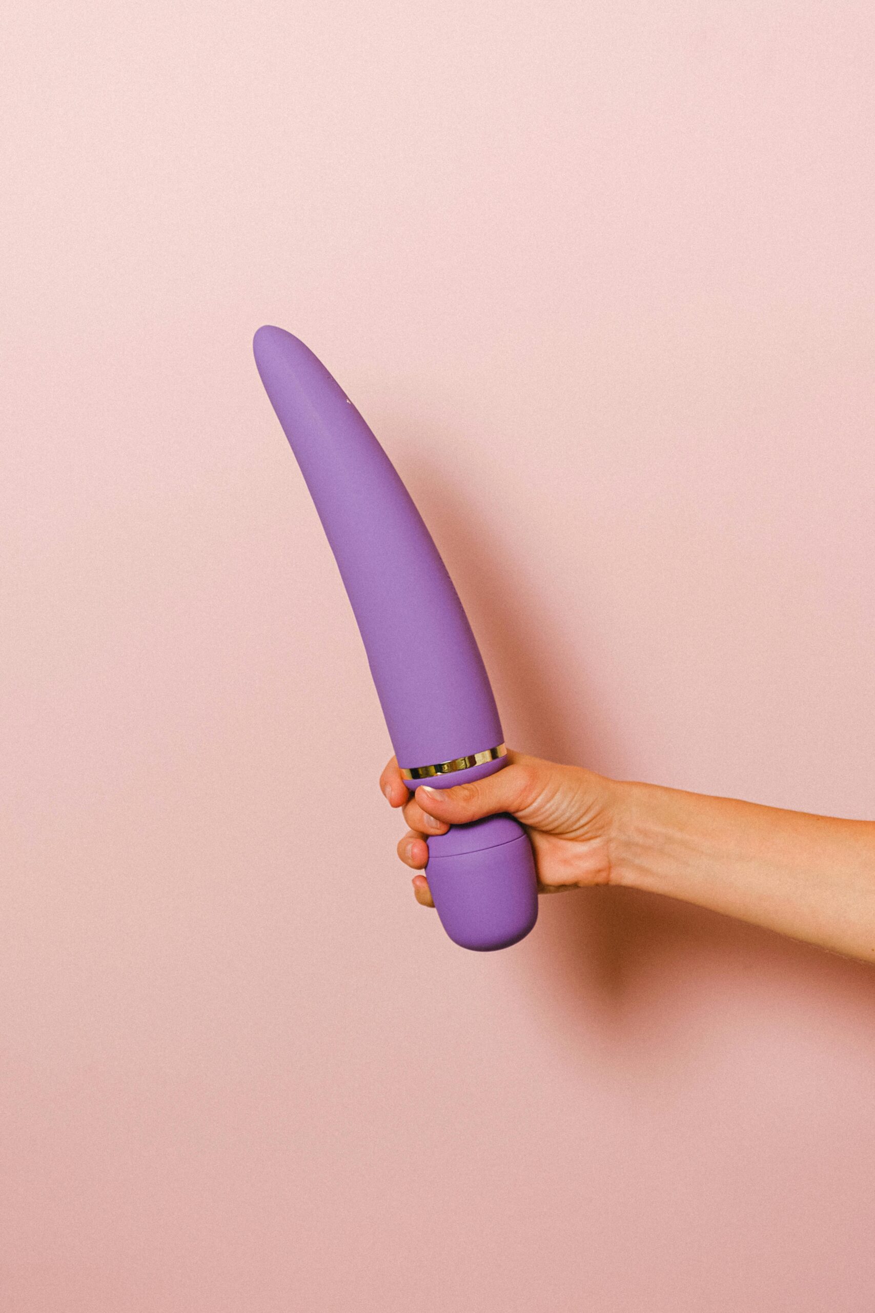 Holding dildo