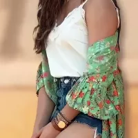 25 hot photos of Rashmika Mandanna flaunting her sexy legs in shorts dresses and high slit gowns.