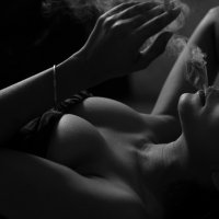 Grayscale Photo of a Sexy Woman Smoking Cigarette Free Stock Photo