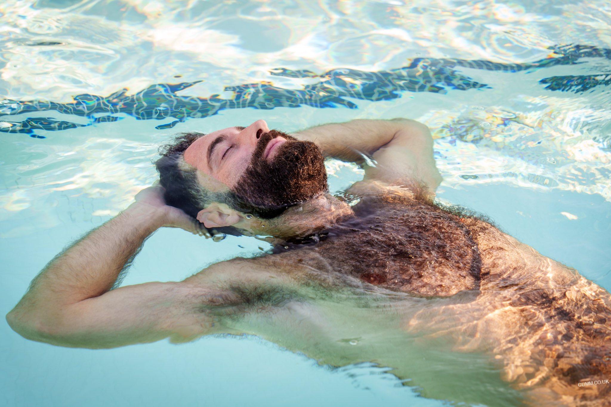 Nude male swimming shower